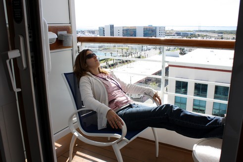 Cate on the balcony real-people-dont-diet-Disney-Wonder